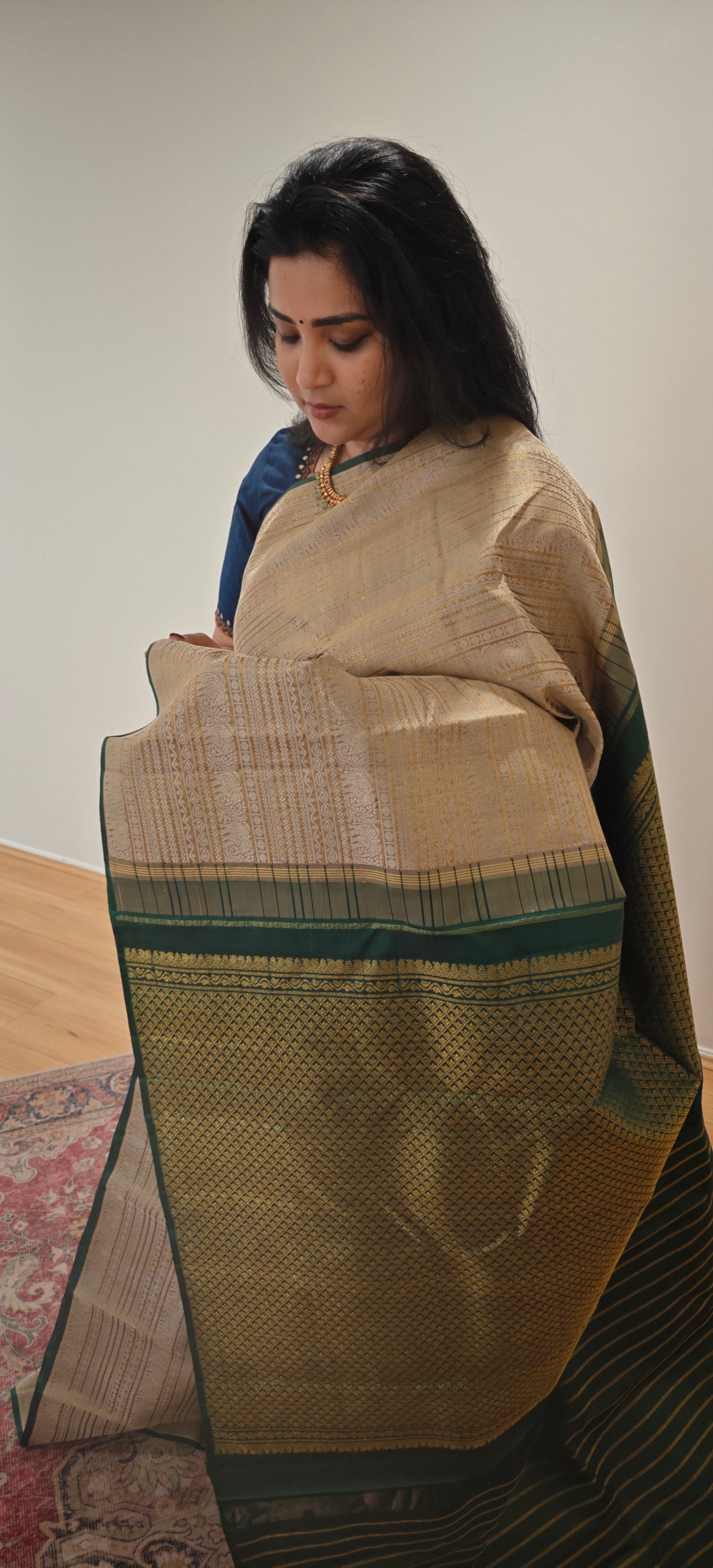 Thread work Kanjivaram silk saree with beige body and green pallu