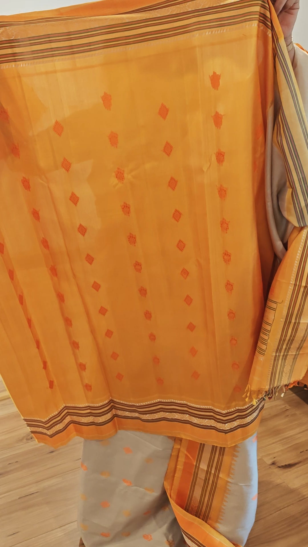Beige with yellow and orange thread work Handwoven Gadwal Silk Sari