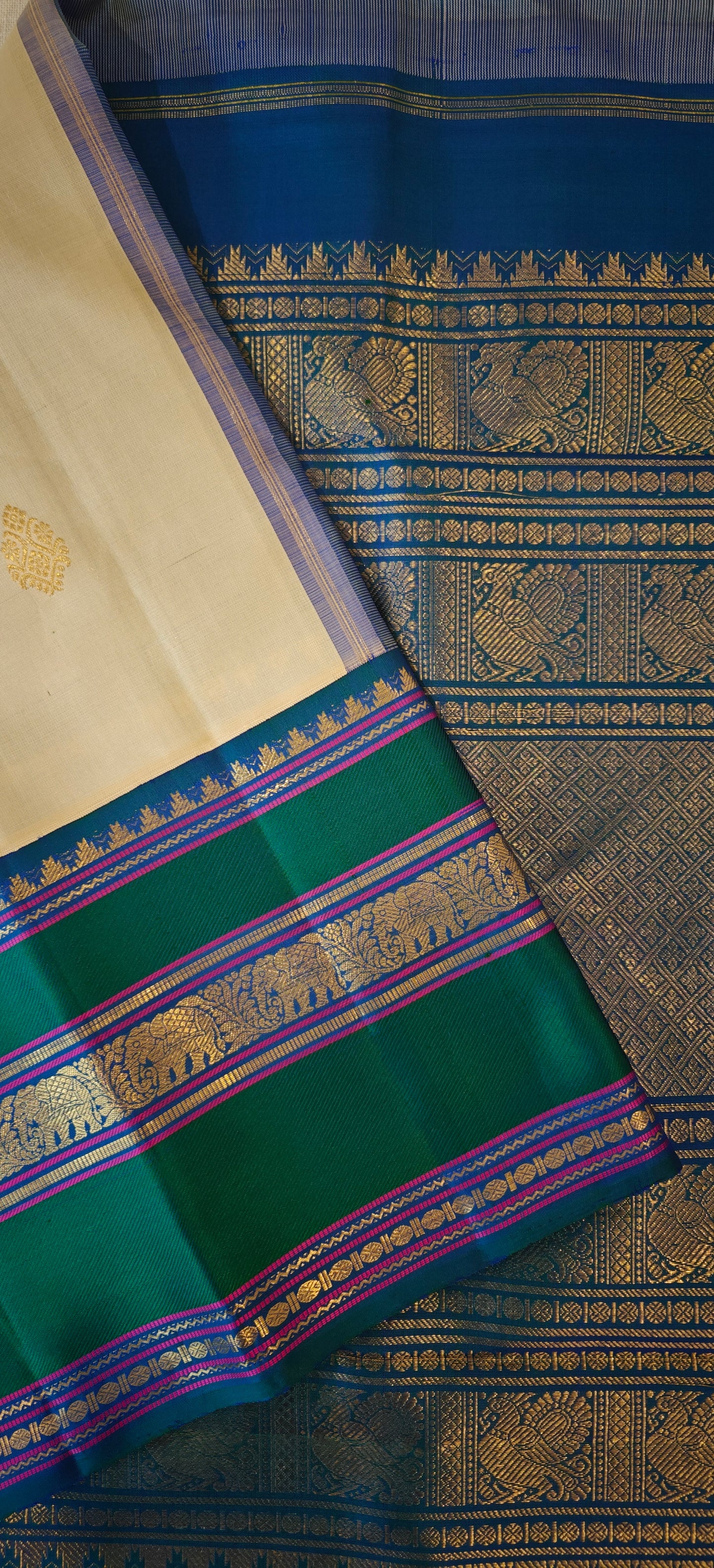 Cream and Peacock blue kanjivaram silk saree