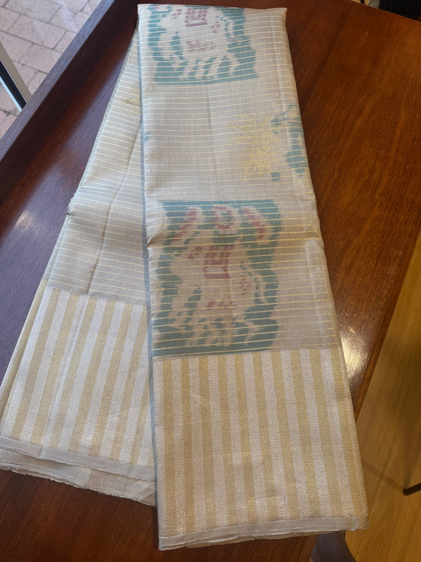 Ikkat on Kanjivaram in beige