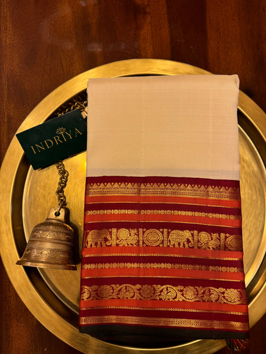 Cream with maroon and orange line border-Kanjivaram Silk Saree