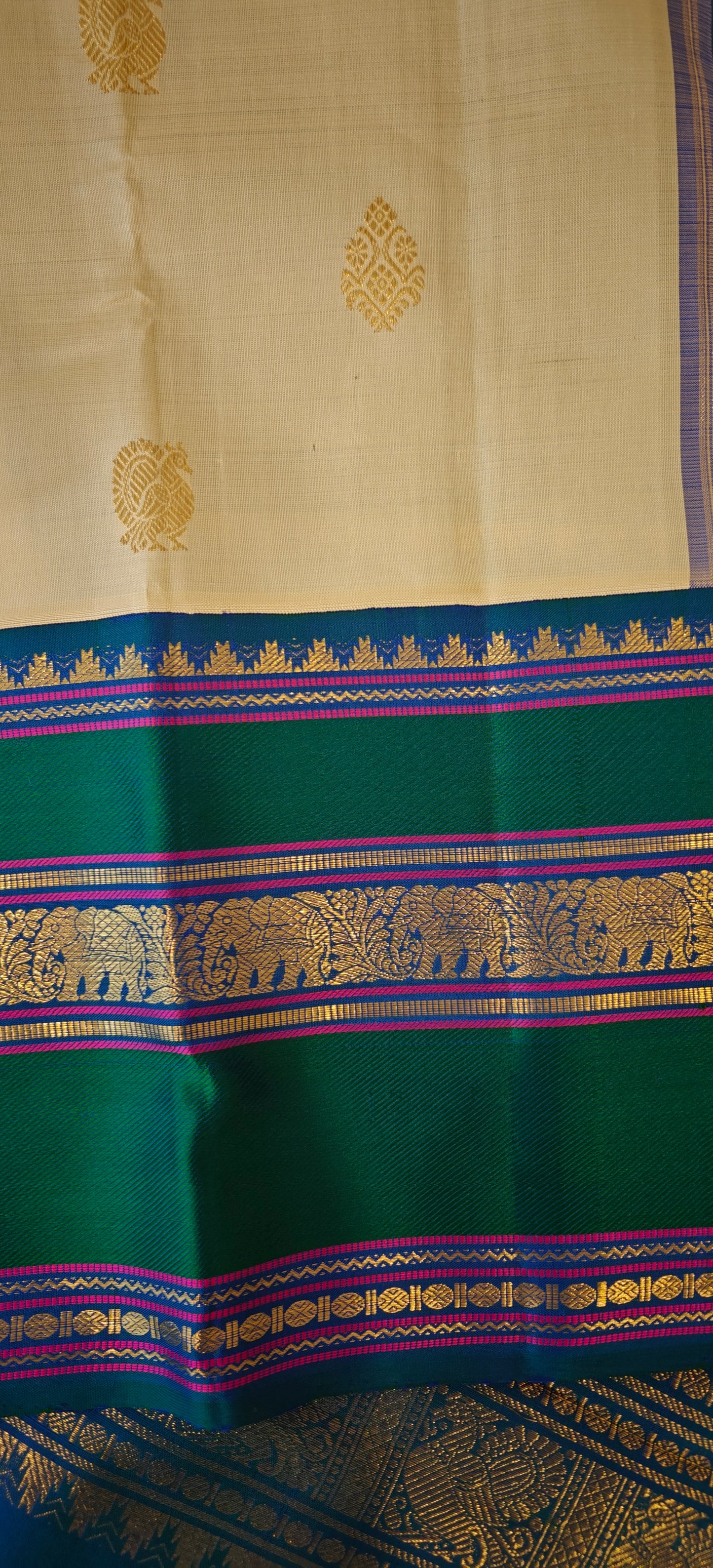 Cream and Peacock blue kanjivaram silk saree