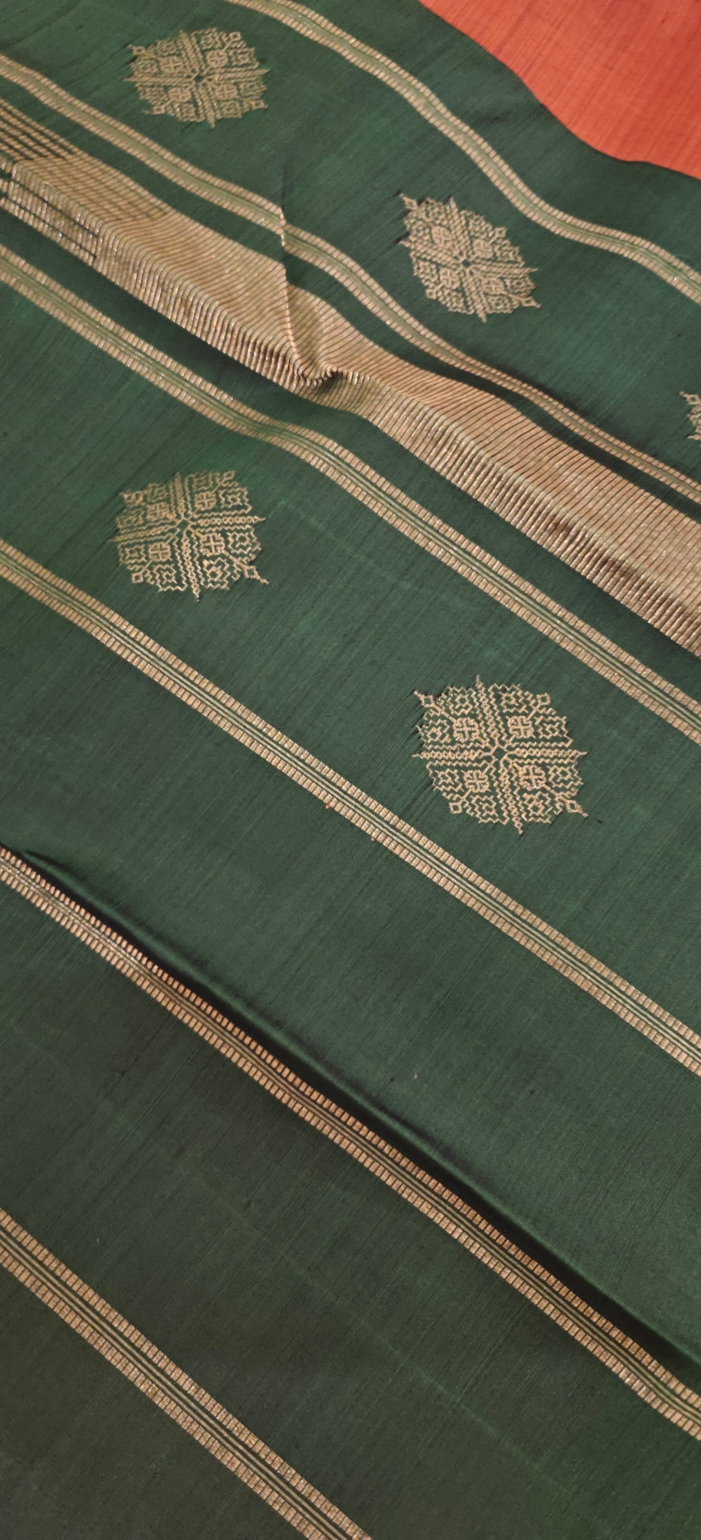 Rust and green kanjivaram silk saree