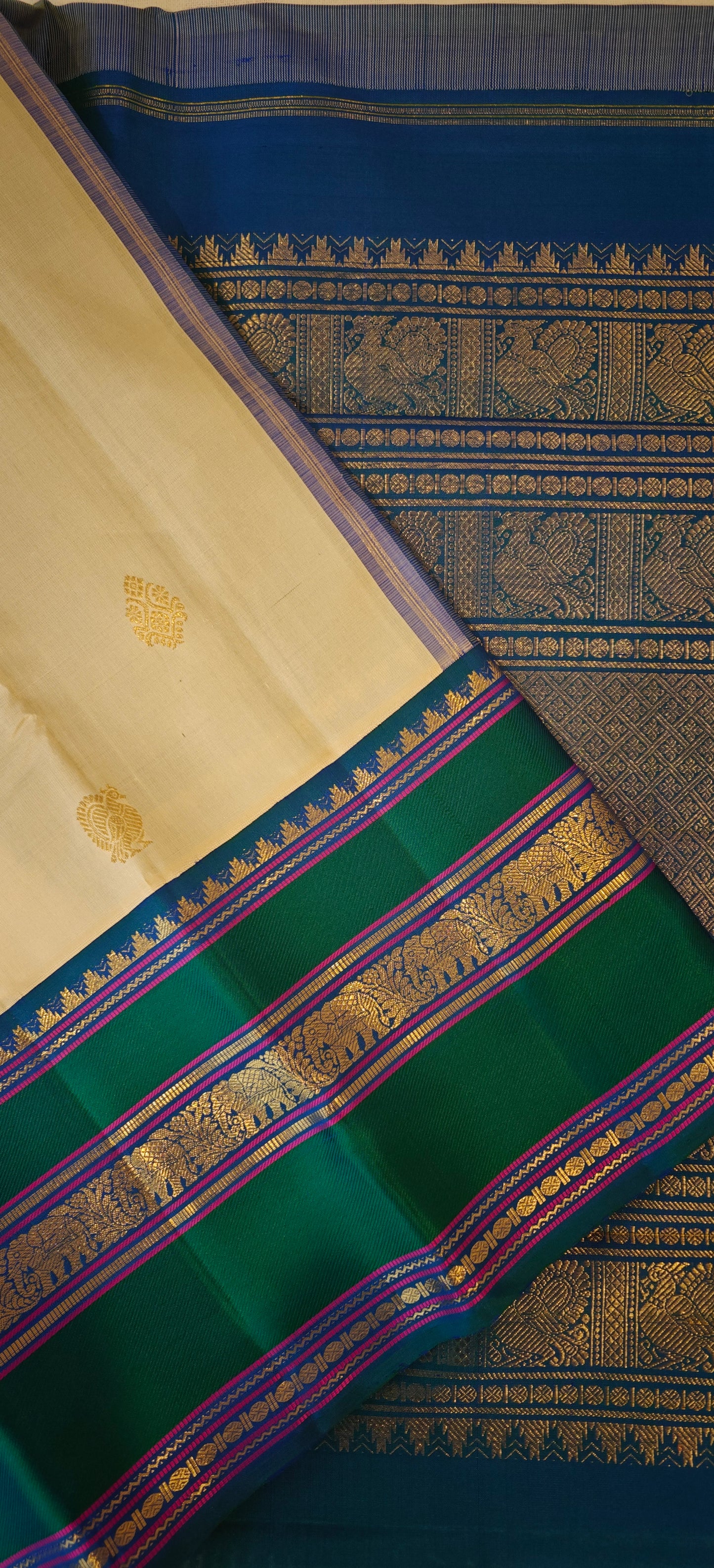 Cream and Peacock blue kanjivaram silk saree