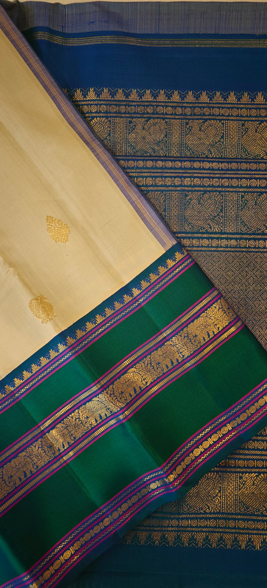 Cream and Peacock blue kanjivaram silk saree