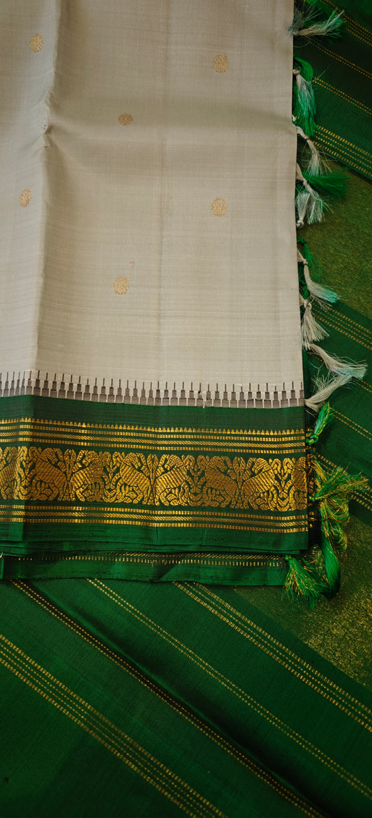 Light blueish green and bottle green kanjivaram silk saree