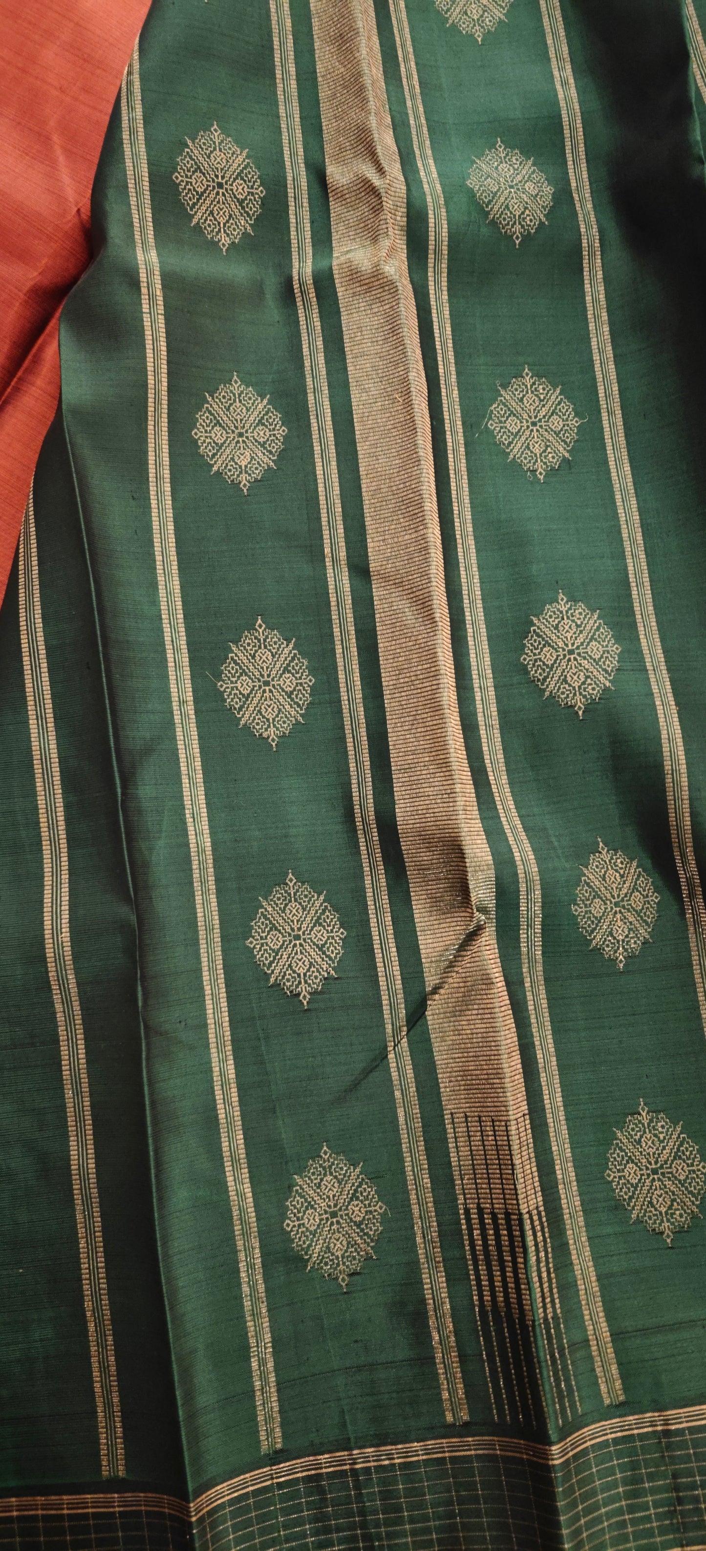 Rust and green kanjivaram silk saree