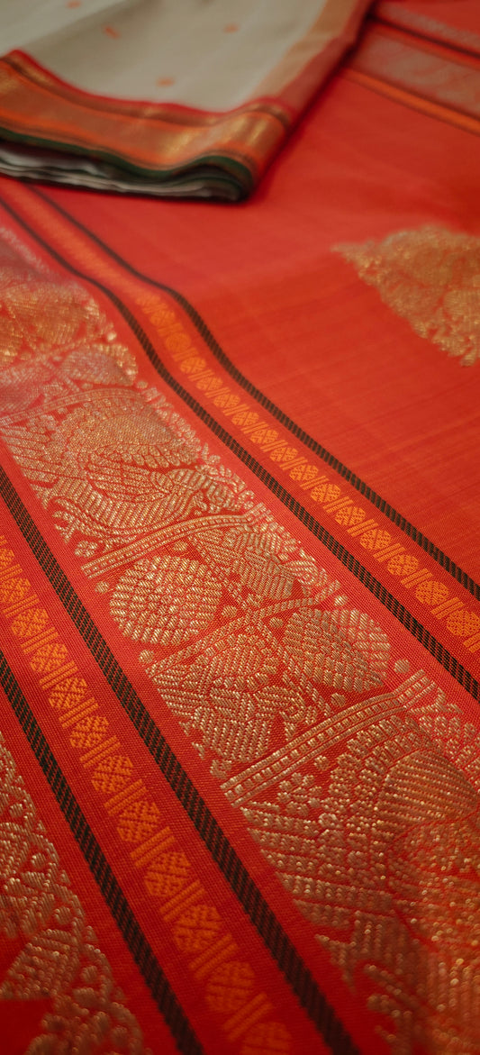Cream and Orange kanjivaram silk saree