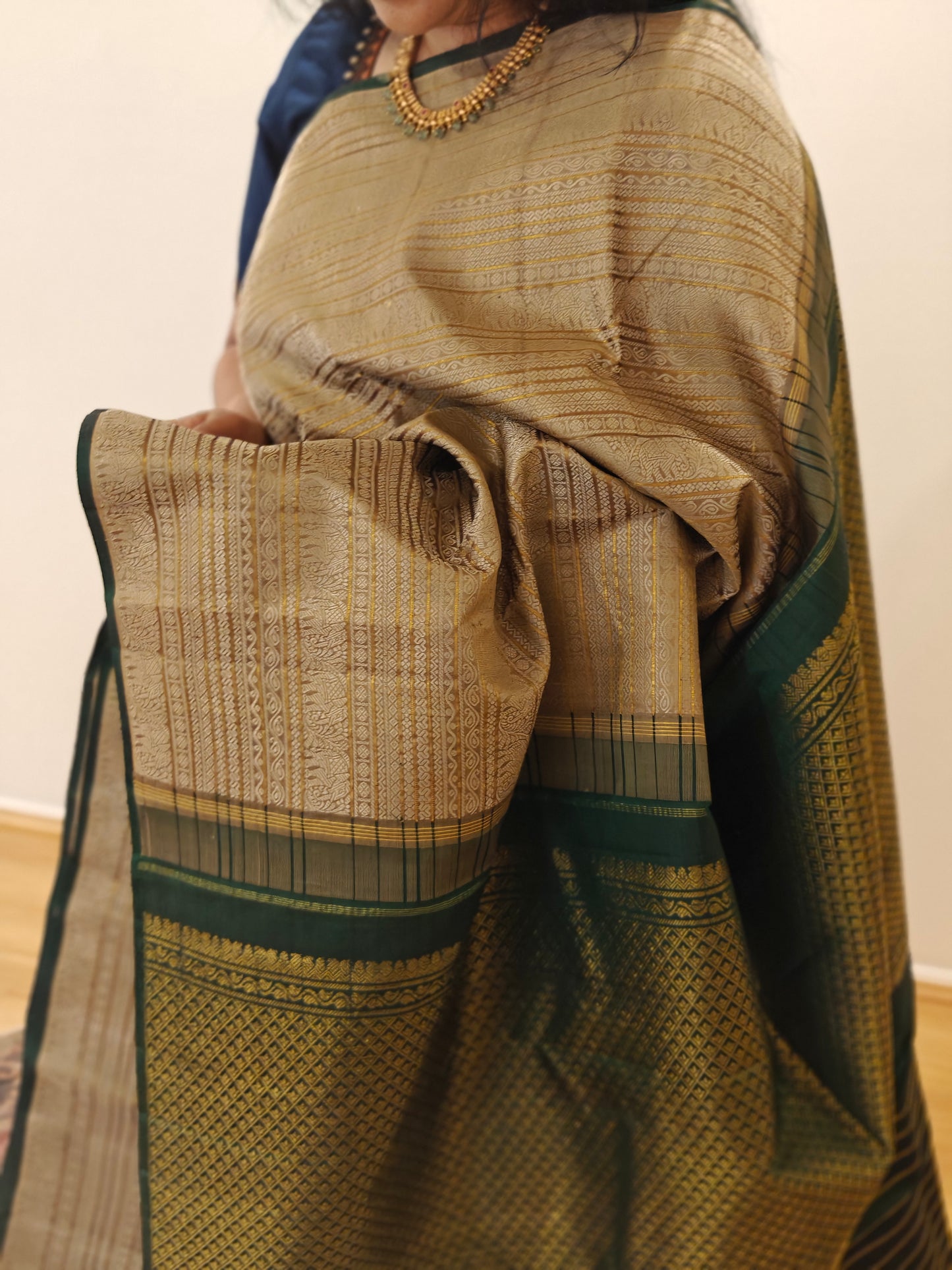 Thread work Kanjivaram silk saree with beige body and green pallu