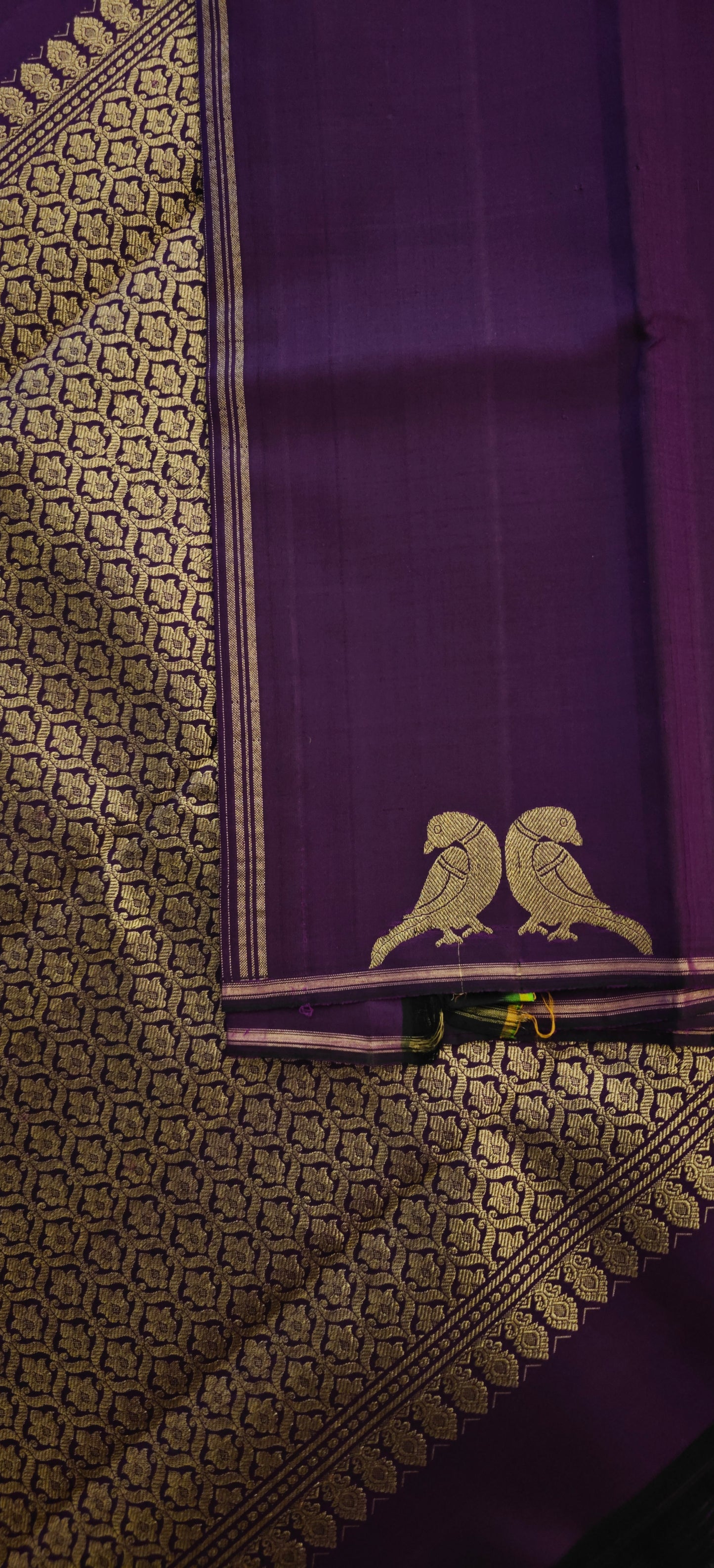 Deep purple Kanjivaram silk saree with parrot motifs