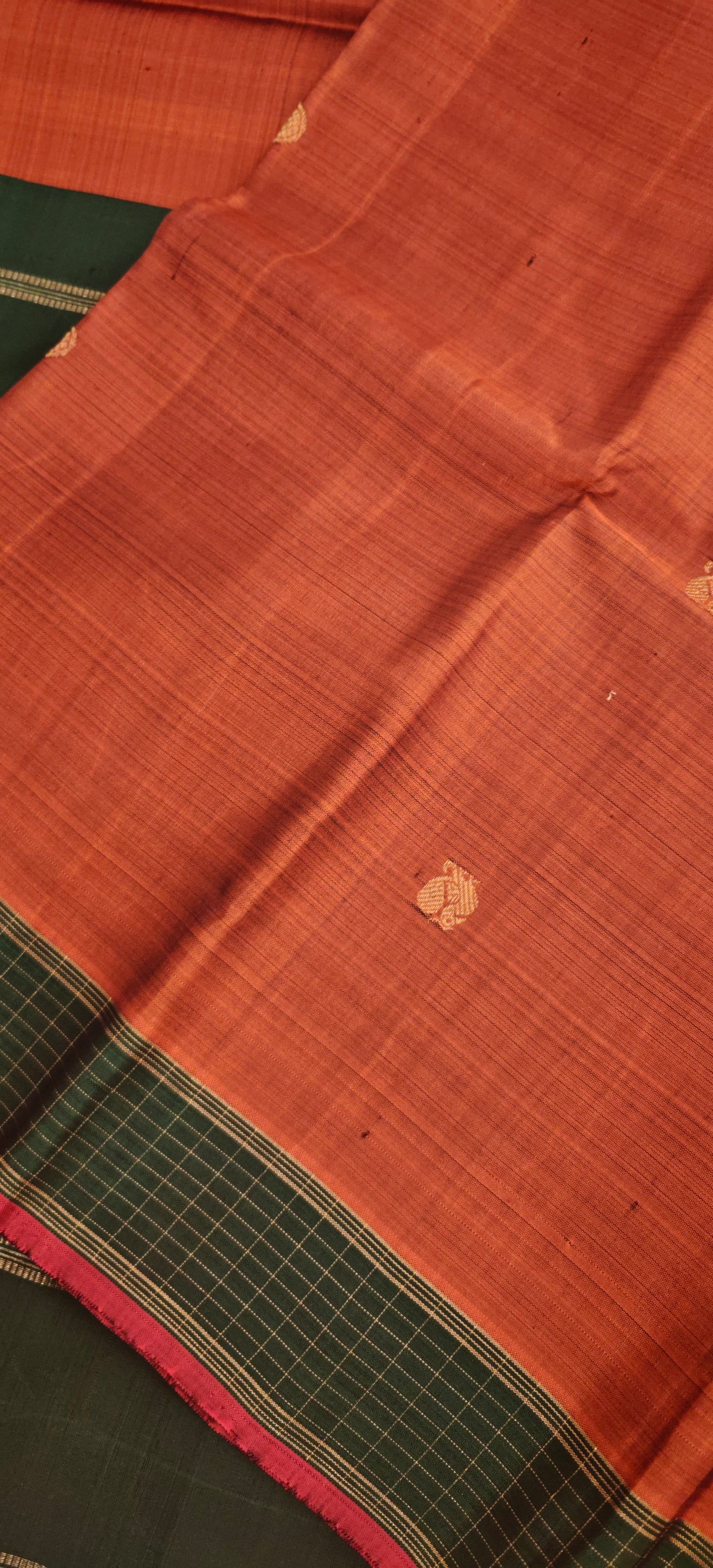Rust and green kanjivaram silk saree