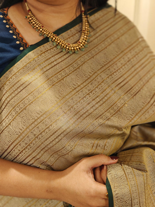 Thread work Kanjivaram silk saree with beige body and green pallu