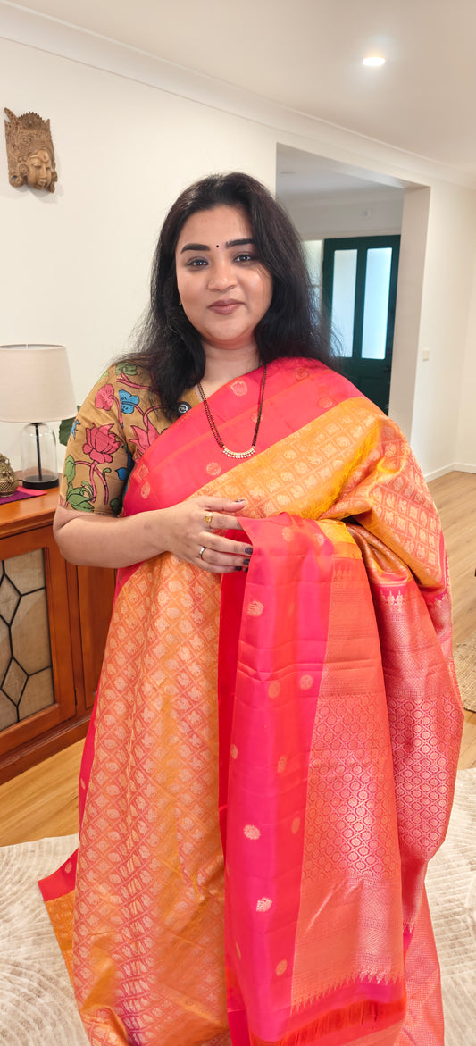 Orange with rani pink kanjivaram silk saree