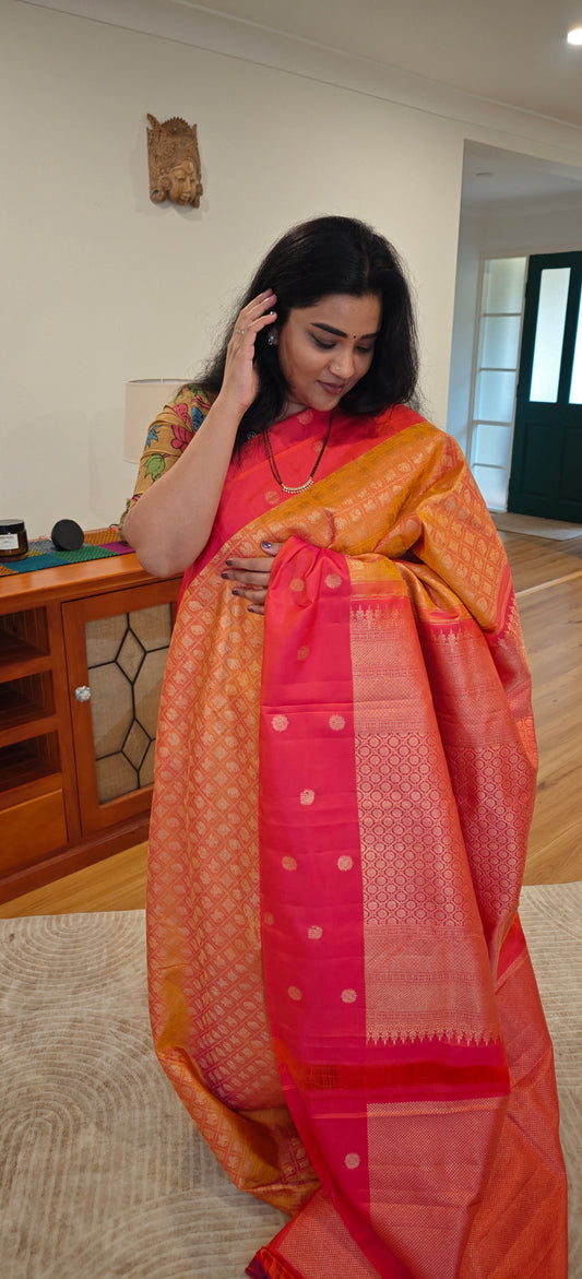Orange with rani pink kanjivaram silk saree